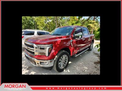 2024 Ford F-150 LARIAT in Rapid Red Metallic Tinted Clearcoat — front three-quarter view