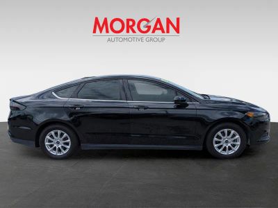 2015 Ford Fusion — rear three-quarter view