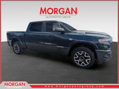 2026 Ram 1500 Laramie in Blue — front three-quarter view