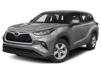 2021 Toyota Highlander L in White — front three-quarter view