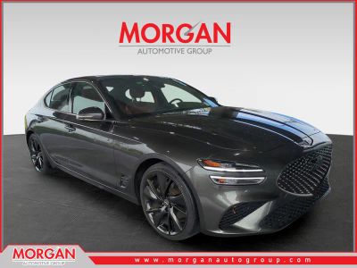 2023 Genesis G70 2.0T in Makalu Gray — front three-quarter view