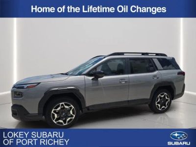 2026 Subaru Outback Touring in River Rock Pearl — front three-quarter view