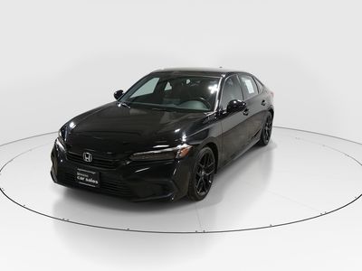 2024 Honda Civic Sedan — rear three-quarter view