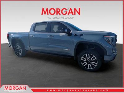 2024 GMC Sierra 1500 AT4 in Gray — front three-quarter view