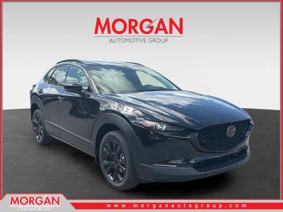 2026 Mazda CX-30 2.5 Turbo Premium Plus in Jet Black Mica — front three-quarter view