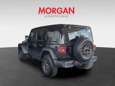 2026 Jeep Wrangler — rear three-quarter view