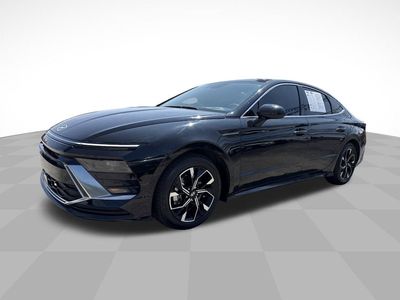 2024 Hyundai Sonata SEL in Black — front three-quarter view