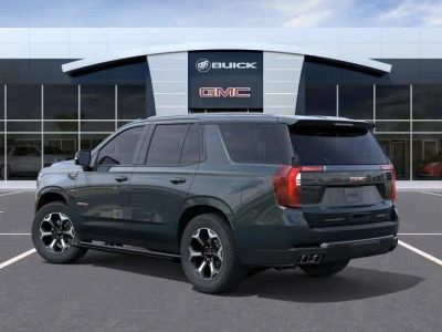 2026 GMC Yukon — rear three-quarter view