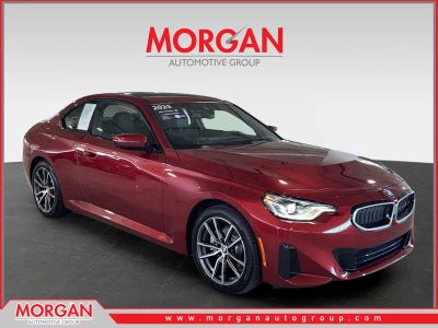 2025 BMW 2 Series 230i xDrive in Red — front three-quarter view