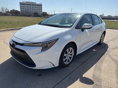 2024 Toyota Corolla LE in White — front three-quarter view