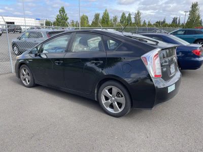 2013 Toyota Prius — rear three-quarter view