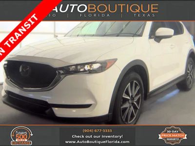 2018 Mazda CX-5 Touring in Snowflake White Pearl Mica — front three-quarter view