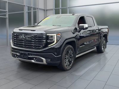 2022 GMC Sierra 1500 Denali Ultimate in Onyx Black — front three-quarter view