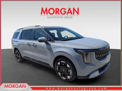 2026 Kia Carnival EX in Ceramic Silver — front three-quarter view