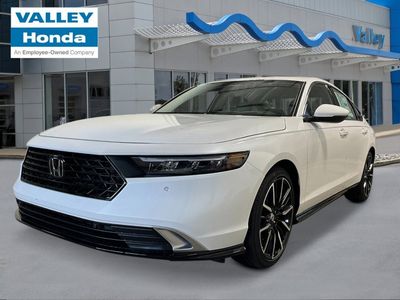 2026 Honda Accord Hybrid Touring in Platinum White Pearl — front three-quarter view