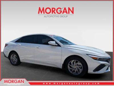 2024 Hyundai Elantra SEL in Serenity White — front three-quarter view