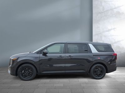 2026 Kia Carnival — rear three-quarter view