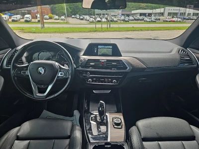 2018 BMW X3 — rear three-quarter view
