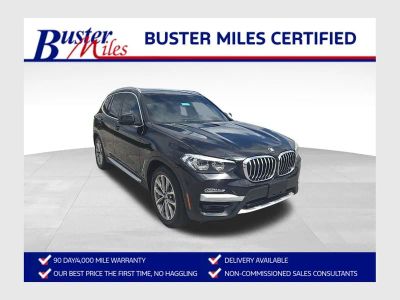 2018 BMW X3 xDrive30i in Black Sapphire Metallic — front three-quarter view