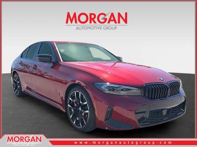2025 BMW 3 Series 330i in Red — front three-quarter view