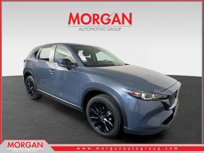 2024 Mazda CX-5 2.5 S Carbon Edition in Machine Gray Metallic — front three-quarter view