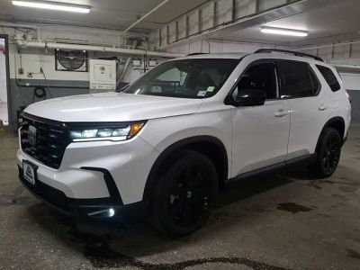2025 Honda Pilot — rear three-quarter view