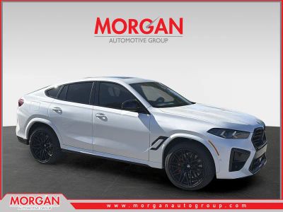 2026 BMW X6 M Competition in White — front three-quarter view
