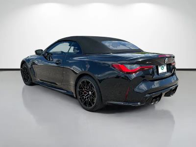 2023 BMW M4 — rear three-quarter view
