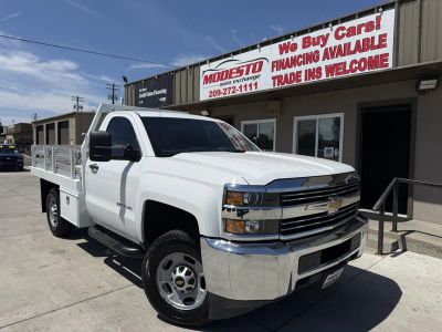 2016 Chevrolet Silverado in White — front three-quarter view