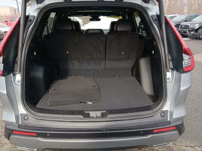 2023 Honda CR-V Hybrid Sport Touring RS6H9PKW — front three-quarter view