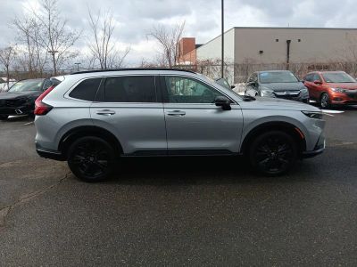 2023 Honda CR-V Hybrid Sport Touring — rear three-quarter view