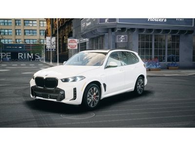 2026 BMW X5 xDrive50e in Alpine White — front three-quarter view