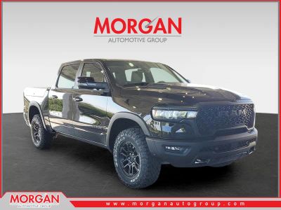 2026 Ram 1500 Rebel in Diamond Black Crystal Pearlcoat — front three-quarter view