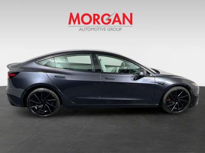 2024 Tesla Model 3 — side profile view