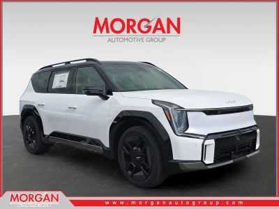2026 Kia EV9 GT-Line in Glacier White Pearl/Ebony Black Roof — front three-quarter view