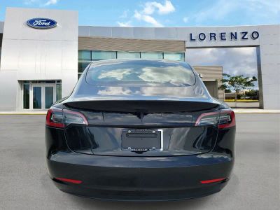 2023 Tesla Model 3 — side profile view