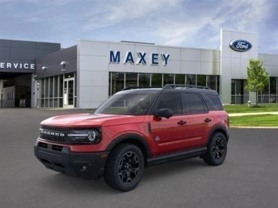 2026 Ford Bronco Sport Outer Banks® in Ruby Red Metallic Tinted Clearcoat — front three-quarter view
