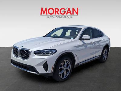 2025 BMW X4 — rear three-quarter view