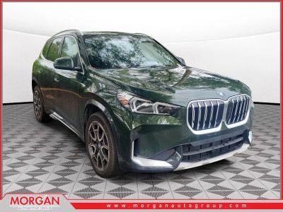 2025 BMW X1 xDrive28i in San Remo Green Metallic — front three-quarter view