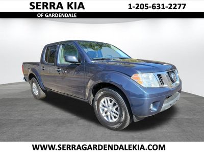 2019 Nissan Frontier SV in Arctic Blue — front three-quarter view