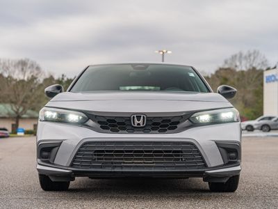 2023 Honda Civic Sport in Silver — front three-quarter view
