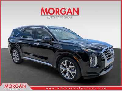 2022 Hyundai Palisade Limited in Abyss Black Pearl — front three-quarter view