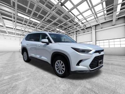 2024 Toyota Grand Highlander XLE in Beige — front three-quarter view