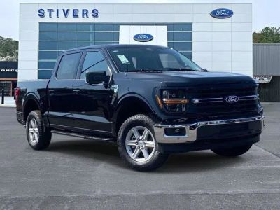 2026 Ford F-150 XLT in Black — front three-quarter view
