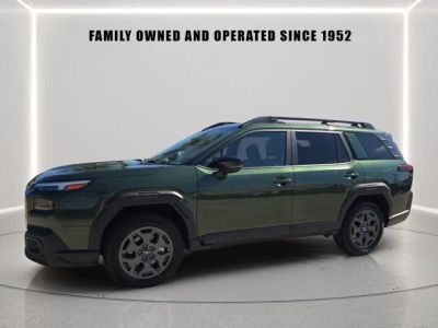 2026 Subaru Outback Premium in Deep Emerald Green Pearl — front three-quarter view