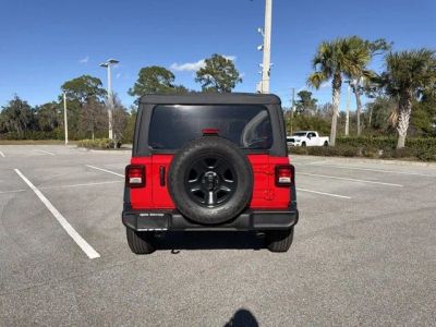 2026 Jeep Wrangler — rear three-quarter view