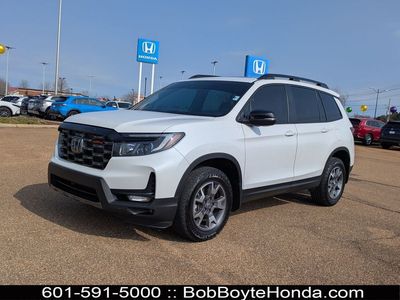 2023 Honda Passport TrailSport in Platinum White Pearl — front three-quarter view