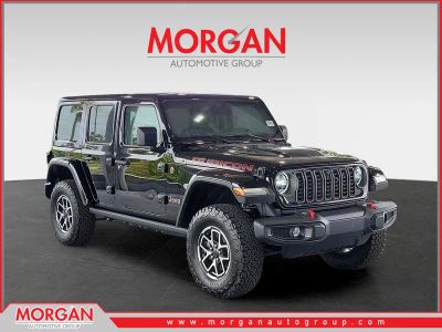 2026 Jeep Wrangler Rubicon in Black Clearcoat — front three-quarter view