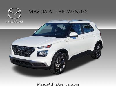 2024 Hyundai Venue SEL in White — front three-quarter view