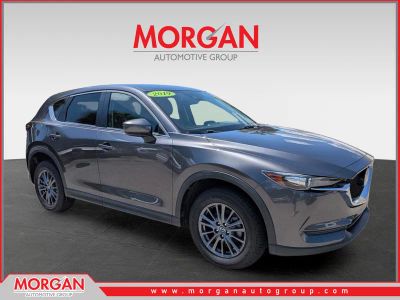 2019 Mazda CX-5 Touring in Machine Gray Metallic — front three-quarter view